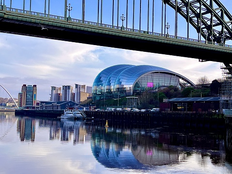 A view of the Newcastle and Gateshead Quayside from under the Tyne Bridge
