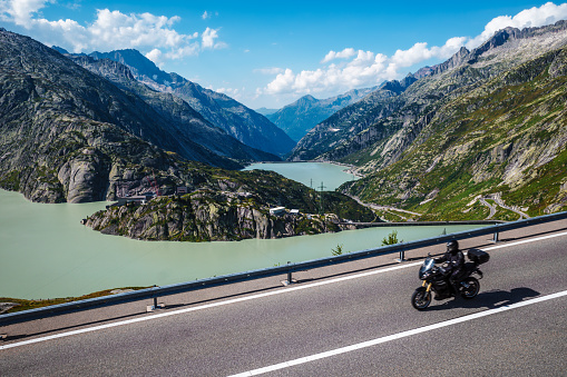 Grimselsee reservoir on the Grimsel mountain pass in Switzerland - a popular destination for bikers