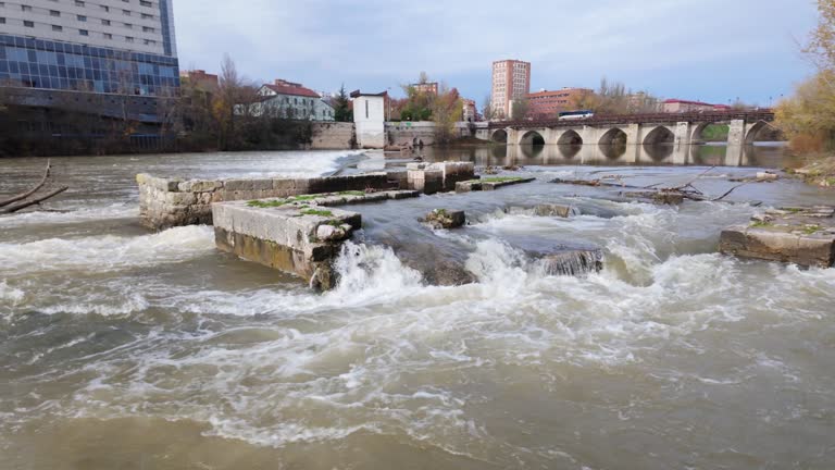 Roman bridge crossing the Pisuerga River in the monumental city of Valladolid, Spain.