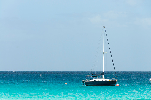 Barbuda, Antigua and Barbuda; June 2015; Sailboat off Low Bay, Barbuda