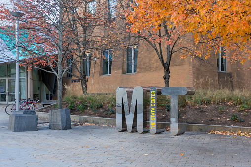 Metal MIT (Massachusetts Institute of Technology) sign in front of Stata Center on the campus in Cambridge, MA, USA, on November 11, 2023. MIT is a private land-grant research university.