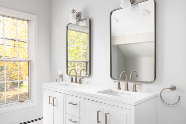 istock A bathroom with a white cabinet and bronze faucets. 1900614731