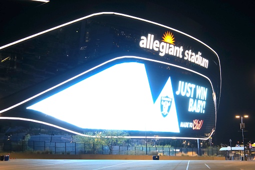 Exterior shot of Allegiant Stadium at night in Las Vegas, Nevada.