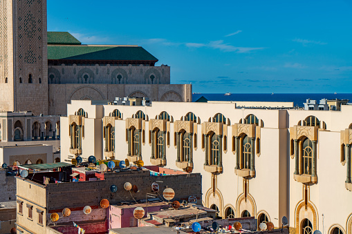 Thiaroye, Dakar, Senegal, Africa – September 3, 2021: Unidentified \nMuslim man standing in front of the mosque wall on a celebration day