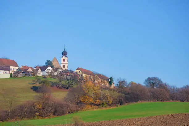 The charming little village of Riegersburg, surrounded by beautiful autumn landscape in Styria region, Austria