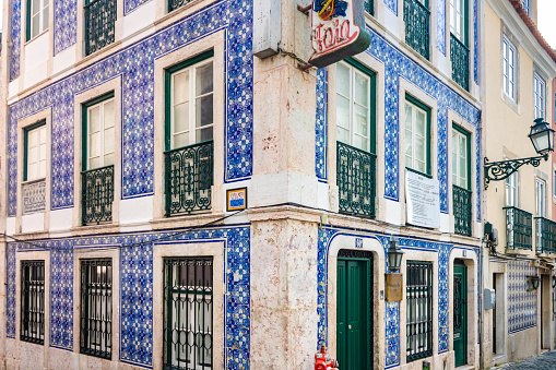 Lisbon, Portugal - November 26th 2023: Tipical tiled house with blue tiles of Bairro Alto