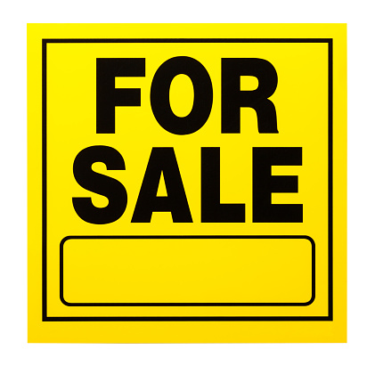 Yellow For Sale Sign Cut Out on White.