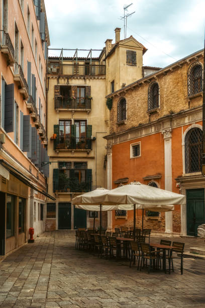 istock Small cafe terrace in Venice, Italy 1900855389