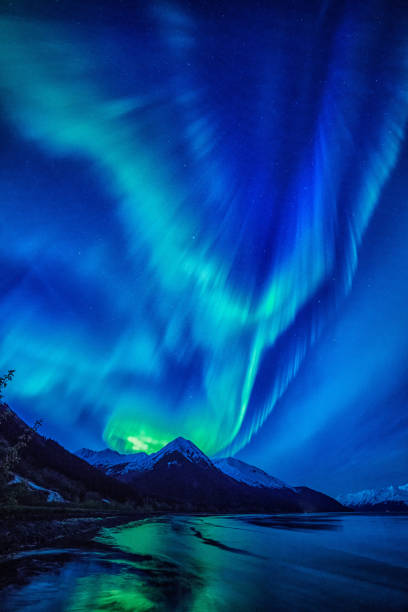 Aurora over Turnagain Arm Aurora borealis over Seward Highway and Turnagain Arm. aurora polaris stock pictures, royalty-free photos & images