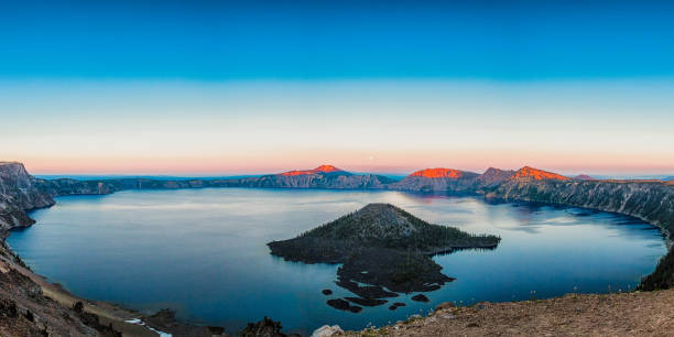 istock Moonrise over Crater Lake and Wizard Island 1900896668