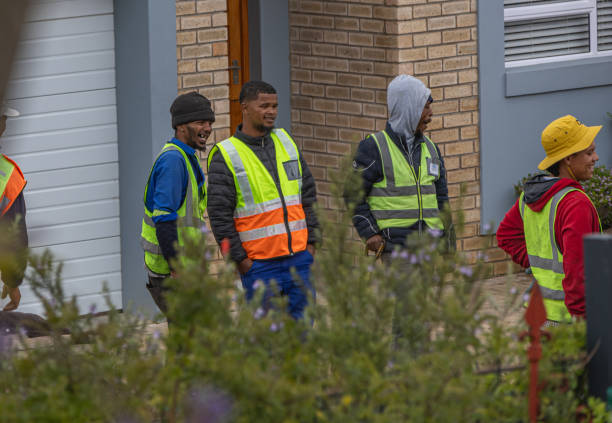 Workmen sharing a joke stock photo