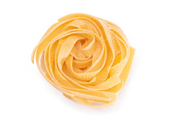 istock One Classic Italian Raw Egg Fettuccine - Isolated on White Background 1900944568