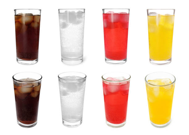 istock Collage of tasty refreshing soda drinks with ice cubes on white background 1901009963