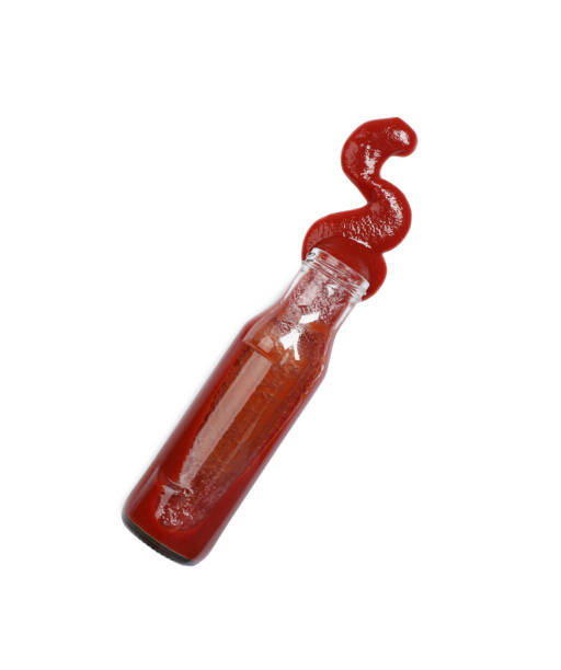istock Ketchup and glass bottle isolated on white, top view 1901010477