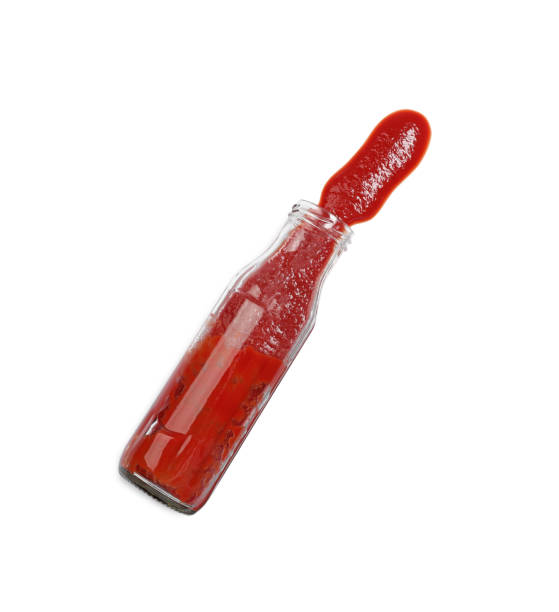 istock Ketchup and glass bottle isolated on white, top view 1901010485