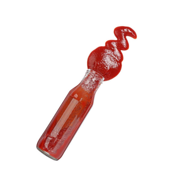 istock Ketchup and glass bottle isolated on white, top view 1901010492
