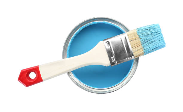 istock Can of light blue paint with brush isolated on white, top view 1901095323