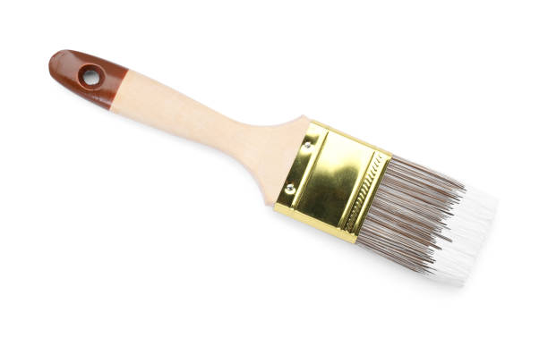 istock Brush with color paint isolated on white, top view 1901095329
