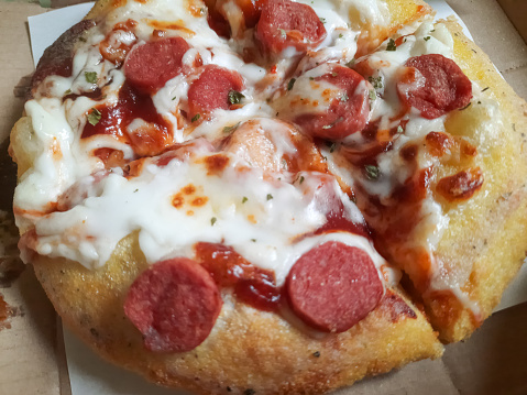 Delicious Pizza With Sausage Toppings. Food Menu