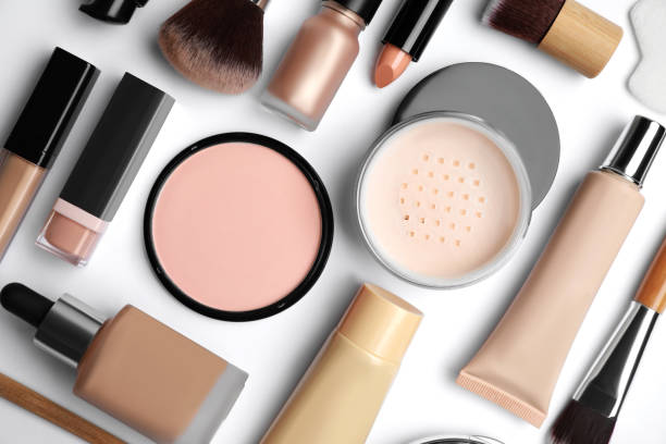 istock Face powders and other decorative cosmetic products on white background, flat lay 1901103080