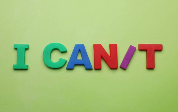 istock Motivation concept. Changing phrase from I Can't into I Can by adding slash symbol on light green background, flat lay 1901123592