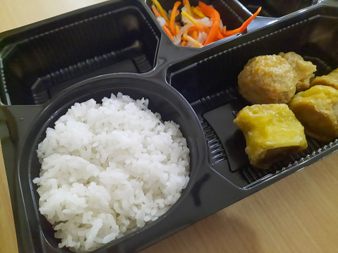 Tasty Bento Box With Special Rice, Salad, Ekkado And Egg Chicken Roll. Food Menu.