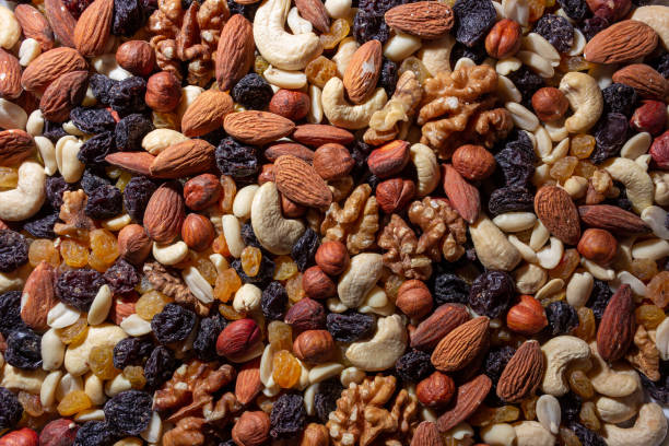 istock Mixed Nuts: Almonds, Walnuts, Cashews, Peanuts, Hazelnuts, Dried Prunes and Raisins 1901173443