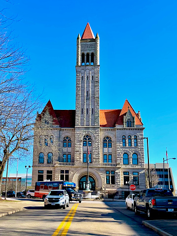 Parkersburg, West Virginia, USA - March 20, 2023: The historic Wood County Courthouse seen against a clear blue sky on a sunny day.
