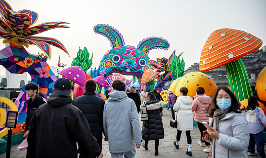 People visit the lantern exhibition on the city wall of Xi'an, Shaanxi, China during the Spring Festival
