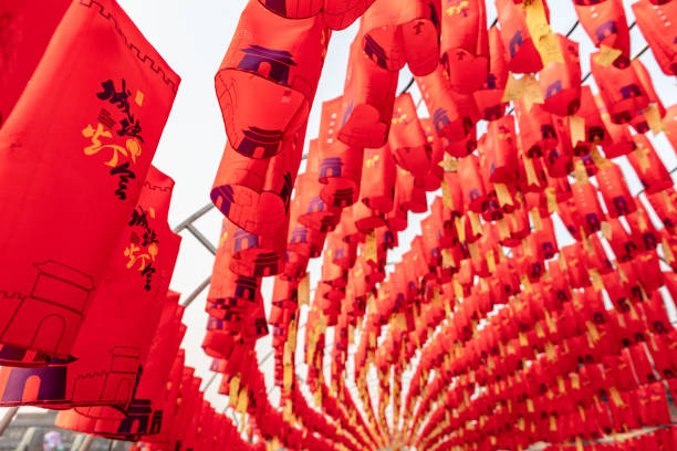 china's 2023 lunar new year, blessing lanterns hanging on the wall of the ancient city of xi'an - china xian chinese lantern wall ストックフォトと画像