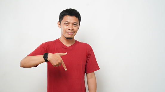 Asian man is using sign language with hand against white background. learn sign language by hand. ASL American Sign Language