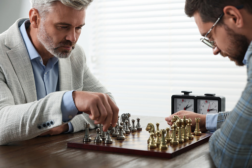 chess pieces on the wood stair by ranking