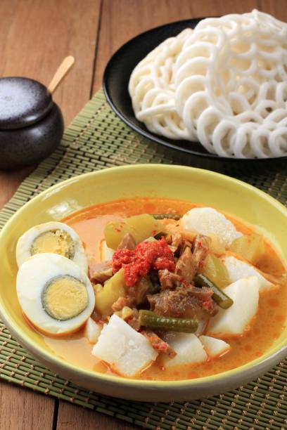 istock Lontong Sayur Padang, Vegetable Curry with Rice Pressed Cake, Served with Boiled Egg 1901297311