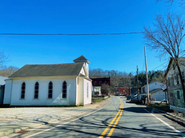 Cairo, West Virginia, USA - March 20, 2023: A wooden church at the entrance to downtown Cairo in Ritchie County.