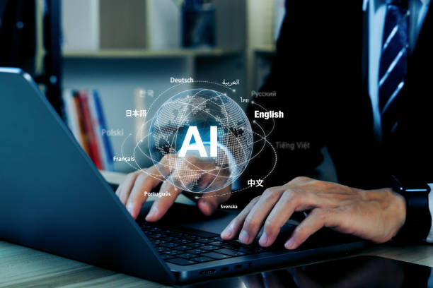 istock Ai translate language concept.Businessman hand with ai translator with blue background, Artificial intelligence chatbot equipped with a Language model technology. 1901356165