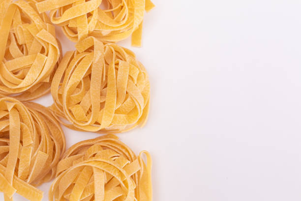 Classic Italian Raw Egg Fettuccine on White Background