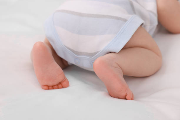 istock Newborn baby lying on white blanket, closeup 1901385898