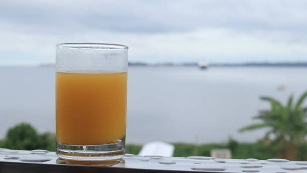 istock Glass of orange juice 1901447553