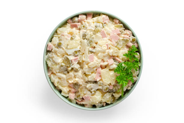 istock Olivier salad in a plate on a white background. 1901475431