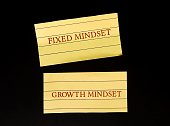 notes with text FIXED MINDSET and GROWTH MINDSET, one who believe intelligence, talent qualities are unchangeable VS one who believe intelligence talent can be developed with practice and effort