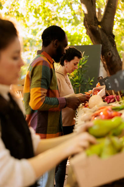 istock Couple look at fresh natural produce 1901509707