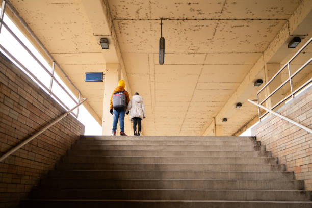 istock Kids on train station 1901536999