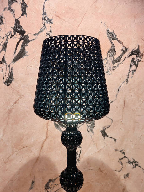istock Black decoration lamp with white pink marble in the background 1901565880