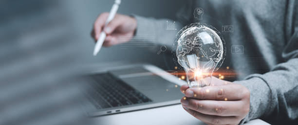 istock Global connecting virtual network structure concept, businessman holding light bulb with business icons, business strategy analysis, finance and banking, technology, innovation and communication. 1901602564