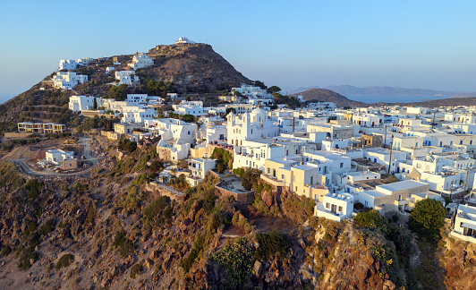 Plaka is the chief town in Milos, a Greek island in the Cyclades group. It is perched on the top of large rock, overlooking the gulf of Milos. No cars can enter the village because of the narrow spaces between walls and buildings.