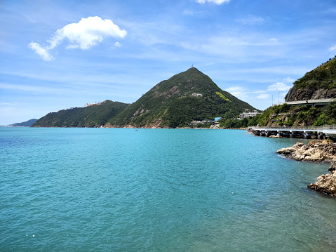 View of Deep Water Bay, located on the southern shore of Hong Kong Island in Hong Kong. The bay is surrounded by Shouson Hill, Brick Hill, Violet Hill and Middle Island.