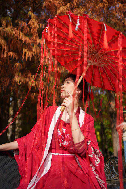 istock woman wearing red hanfu 1901669018