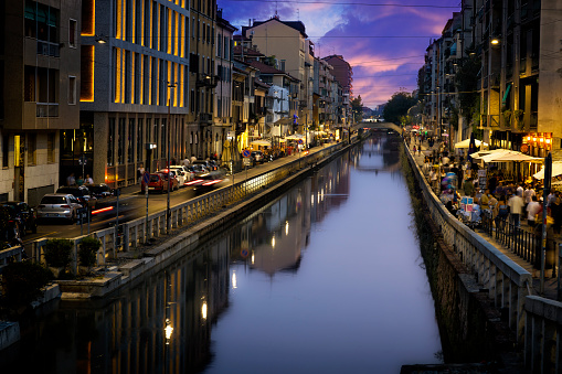 Holidays in Italy - Naviglio Pavese canal in the late evening in Milan