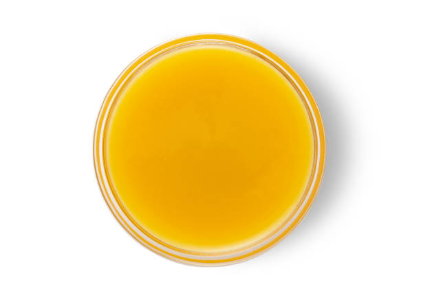 istock Mango fresh organic juice smoothie on white background.Top view.Macro. 1901733693