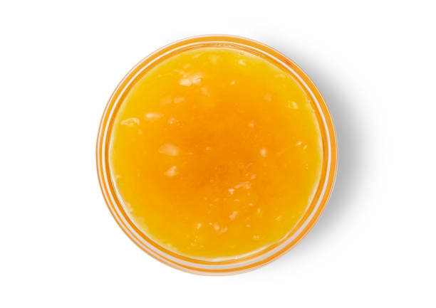 istock Mango sweet breakfast jam in bowl on white background.Top view.Macro. 1901759547